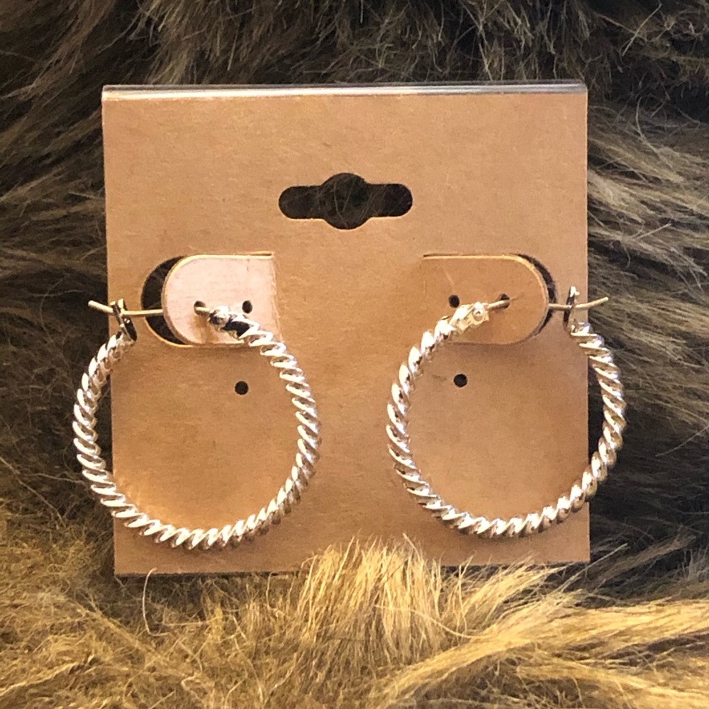 Shiny silver plated twisted hoop earrings